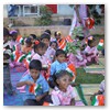 Children being given the National Flag for the March Past